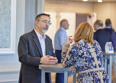 ABA Paul Benda Chats with an IRM Forum Attendee